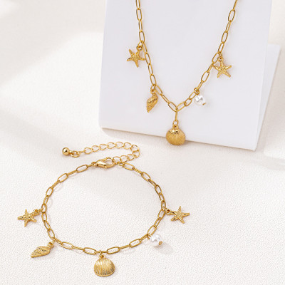 Goldfarbenes Muschel & Seestern Schmuckset | Damen Strand Choker-Halskette & Armband | Sommerurlaub Meeres-Schmuck | Maritimes Ozean-Charm-Set | Filigrane Geschenke für Sie
